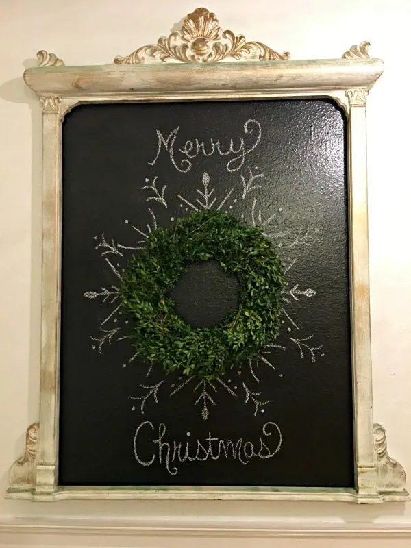 Christmas boxwood Wreath on a vintage chalkboard