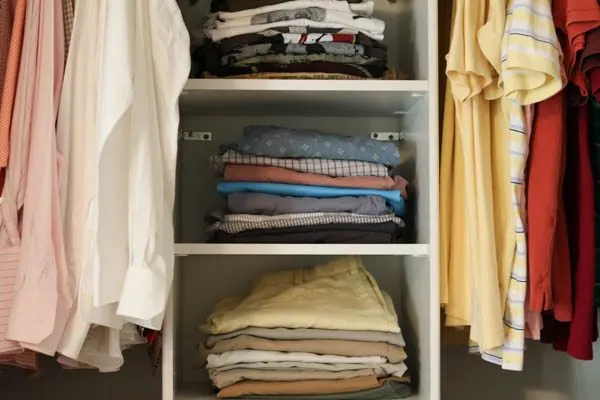 how to organize your home and stay organized by keeping clothes folded neatly.