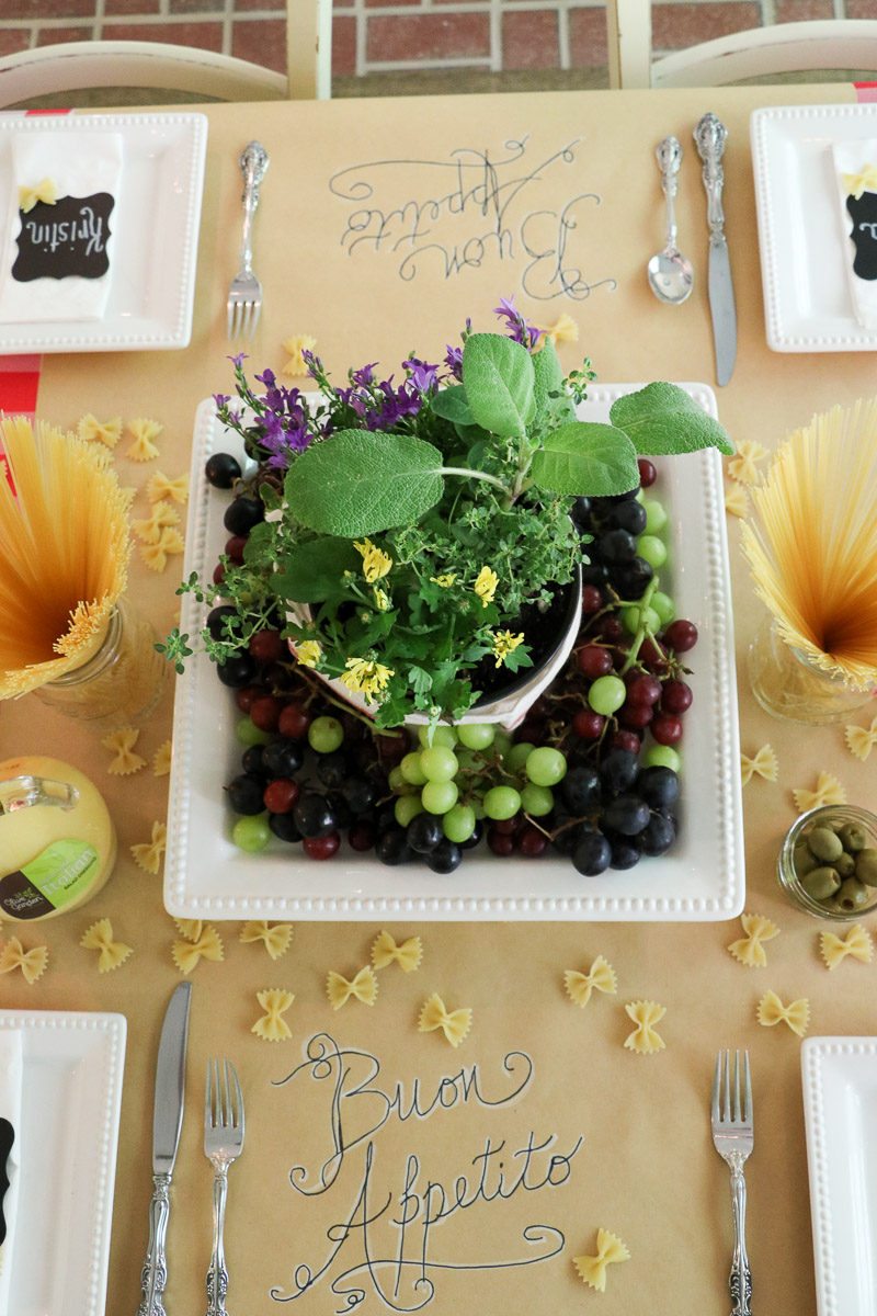 Herb and grapes Italian themed centerpiece