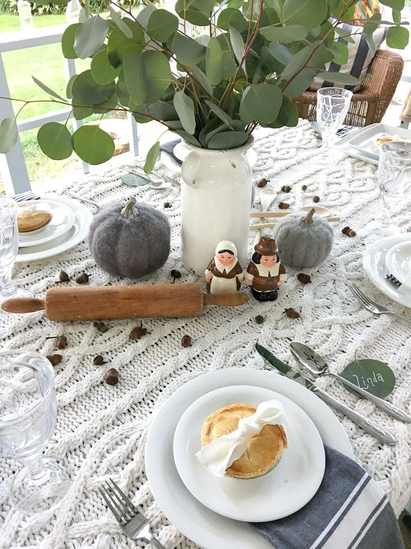 hygge outdoor thanksgiving table pumpkins
