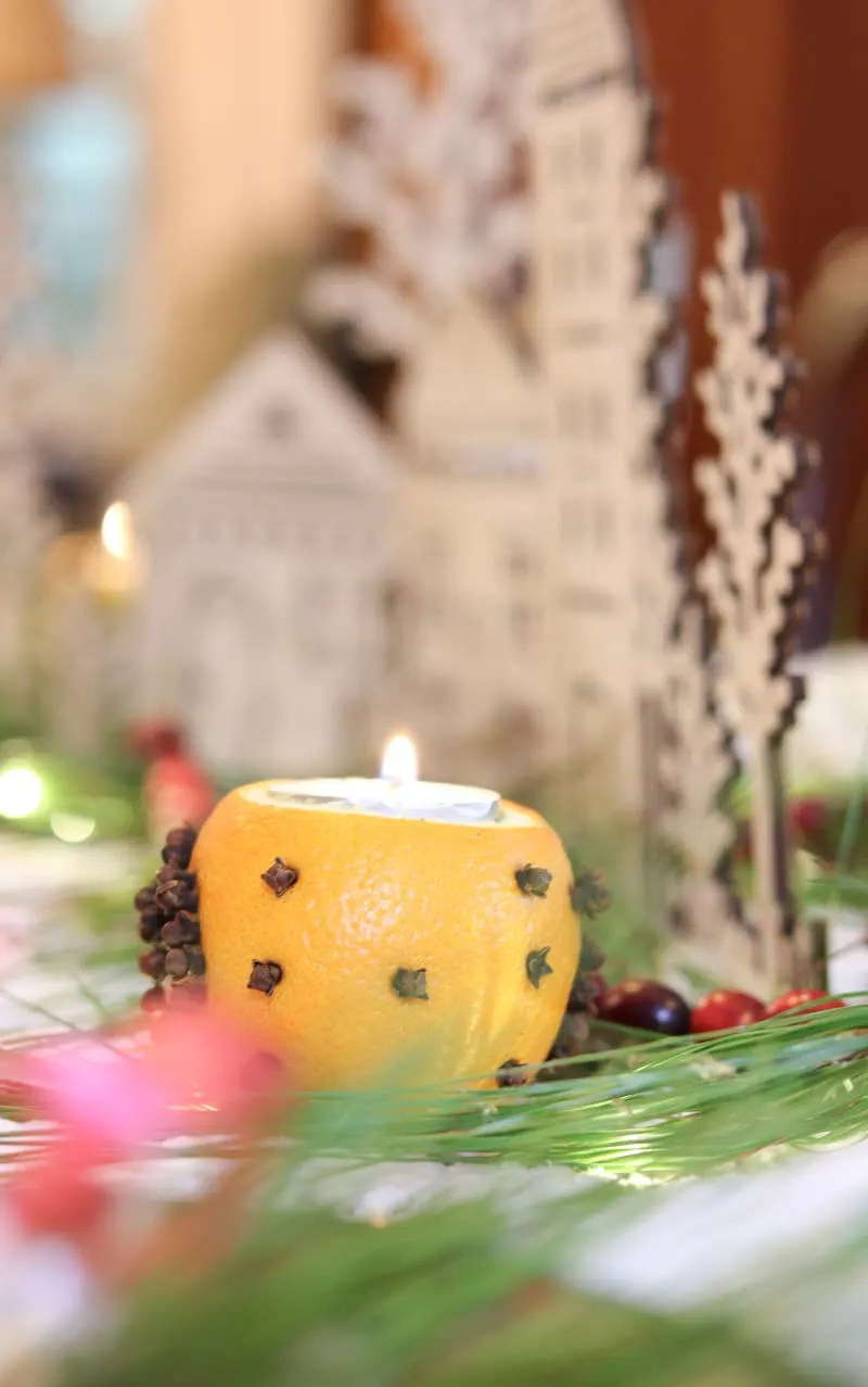 Festive tablescape orange and clove candle