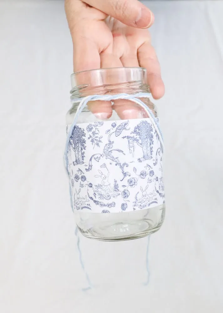 May day basket with a glass jar wrapped in a toile free printable