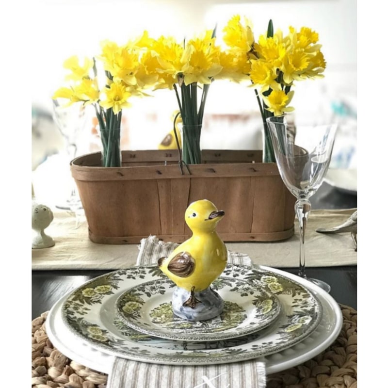 Easter Tablescape of a duck and daffodils place setting by Rah Rags
