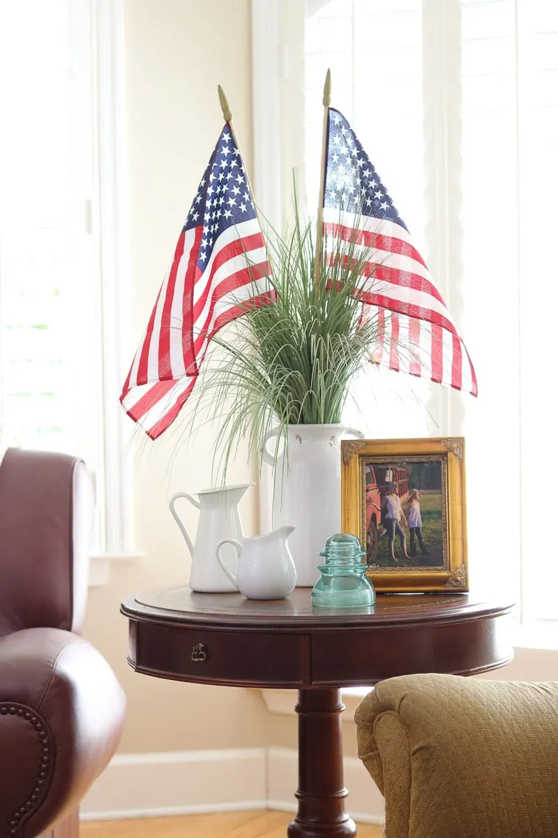 4th of July decorating ideas in the living room with American flags in a vase
