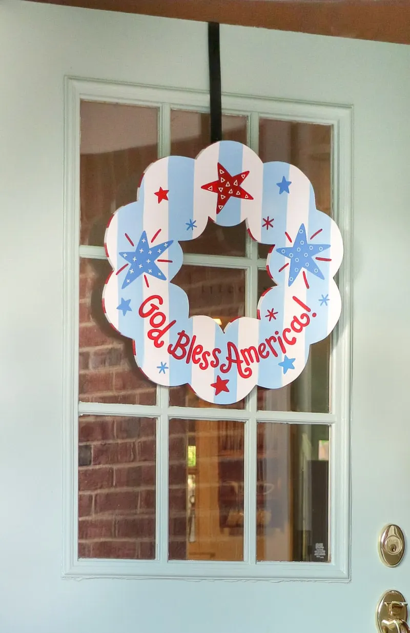 4th of July decorating ideas on a small front porch with patriotic Coton Colors wreath