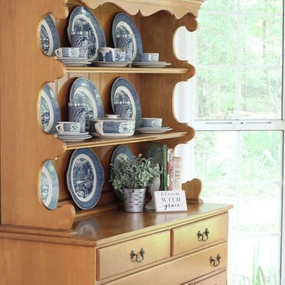Storing and displaying on a farmhouse hutch