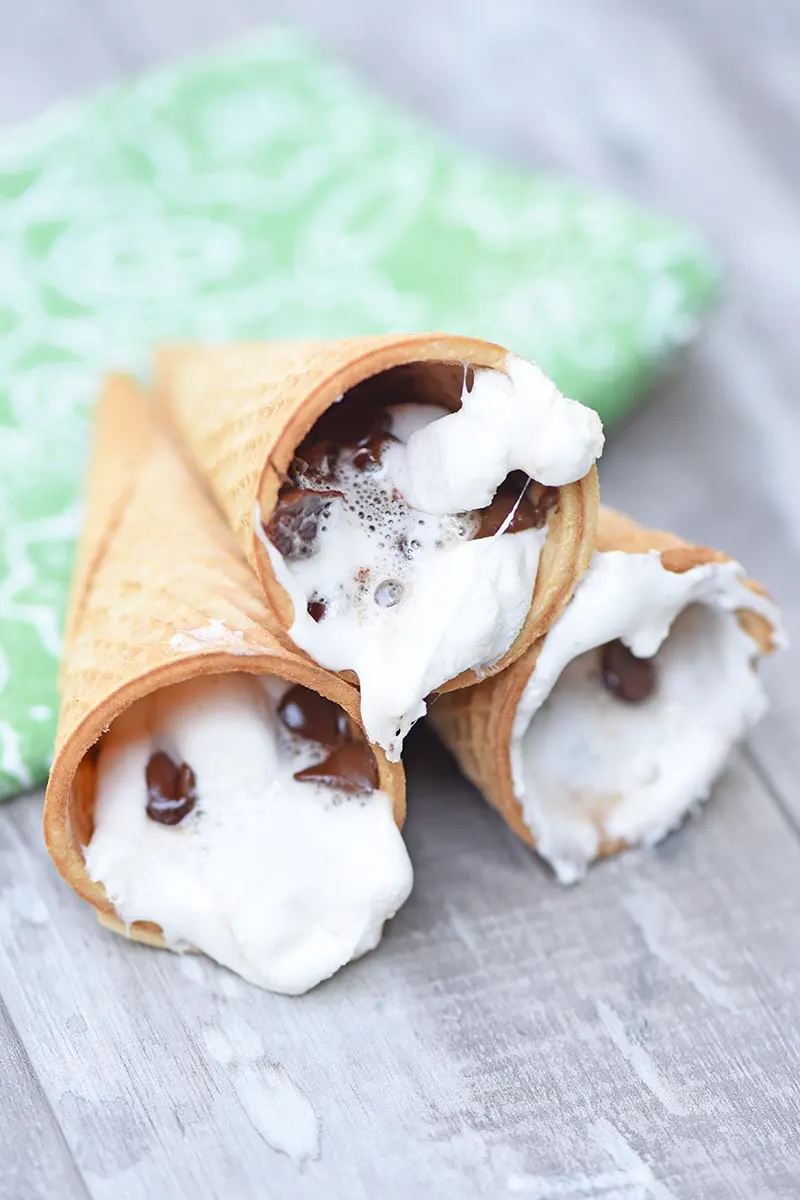 Campfire smores using sugar cones, marshmallows and chocolate chips
