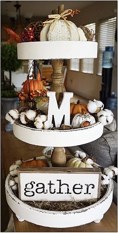 Fall Decor Crystyle Homestylin lovely cottage feeling white tiered tray filled with cotton, pumpkins, berries and a gather sign