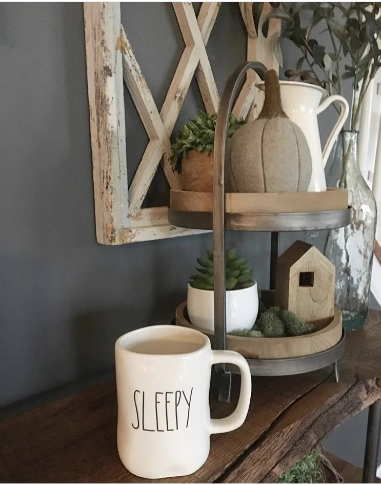 Fall Decor tiered tray by Gnarled Knot. Her modern farmhouse look includes a metal pitcher, felt pumpkin, succulents and a adorable wooden house.