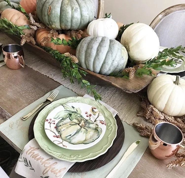 Decorating with dough bowls as a centerpiece on the dinning table filled with pumpkins and gourds by Pollies Place