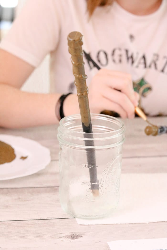 Harry Potter free printables and wand wall hanging. Sit your painted wand in a jar to dry
