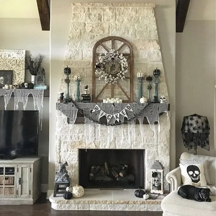Country Halloween Decor by Stager Roz with a decorated living room and fireplace mantel