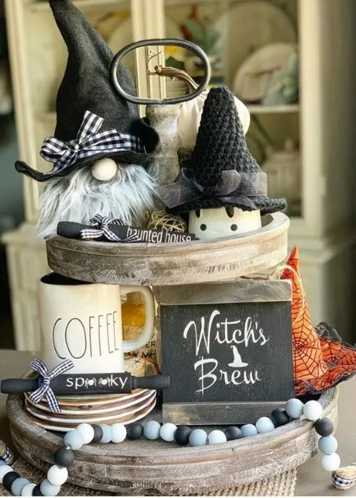 Country Halloween Decor by Design Style By Marci with a witch's brew tiered tray including a gnome, cute marshmallow and wooden beads