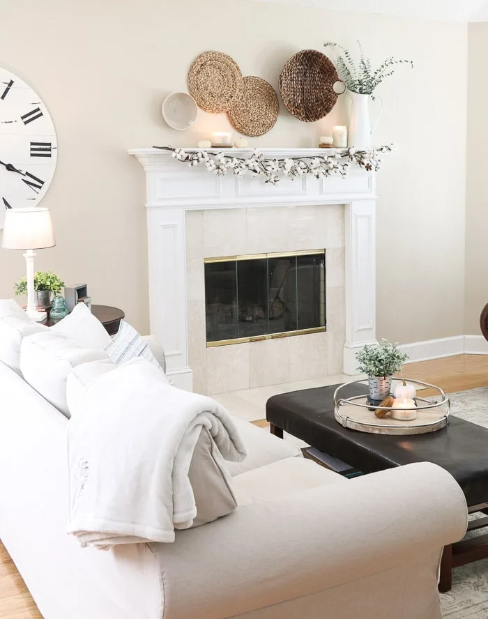 Decorating with wicker baskets over a mantel