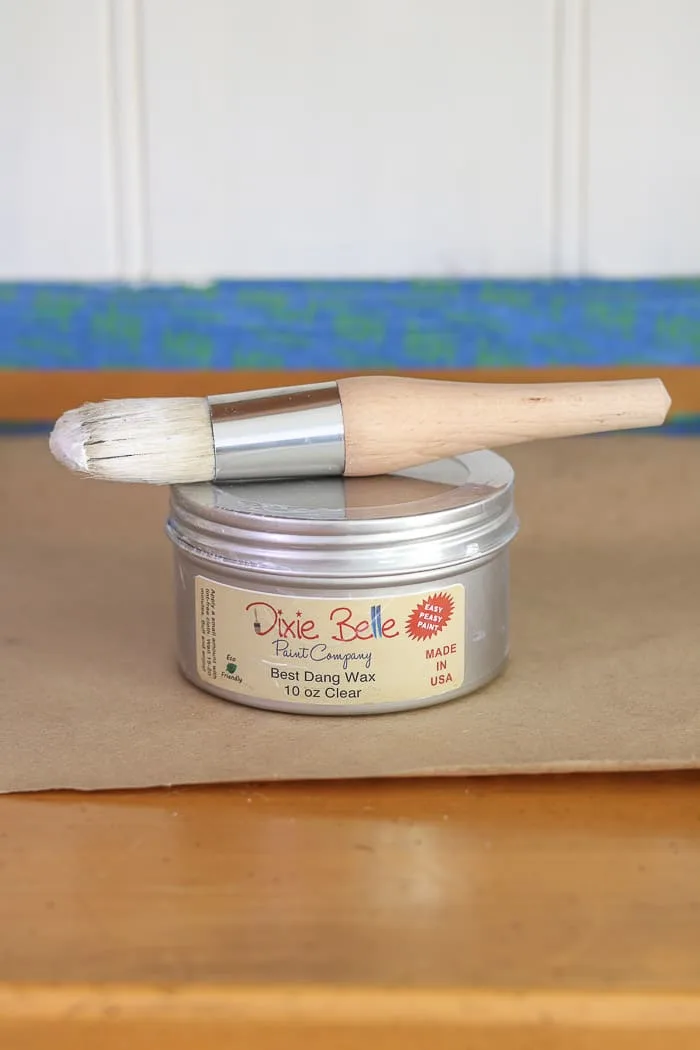 Paint with chalk paint. Can of Dixie Belle best dang wax 10 oz. clear and waxing brush.