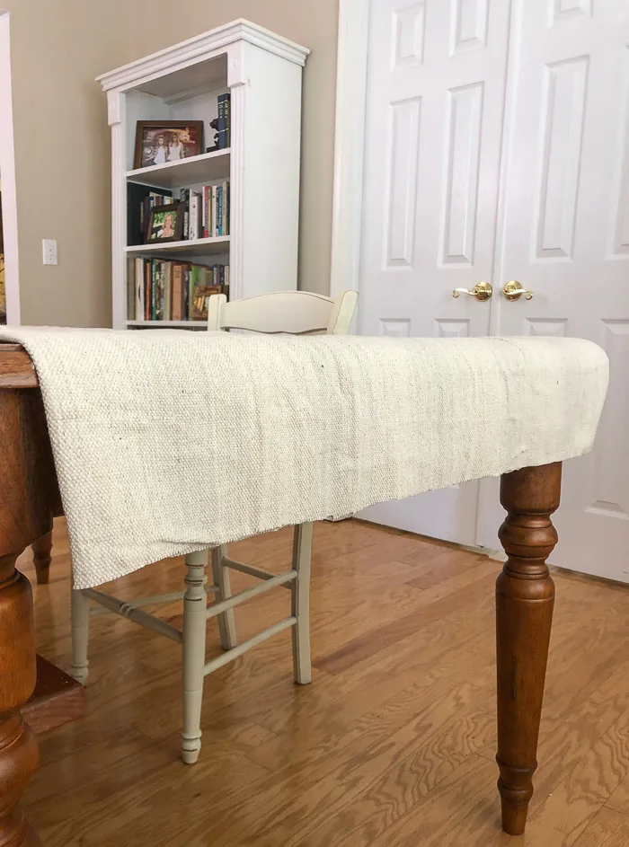 DIY painters canvas drop cloth ruffled table runner holiday. Lay cloth on table