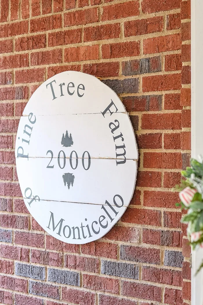 Christmas decorating ideas for front porches using a vintage tree farm sign