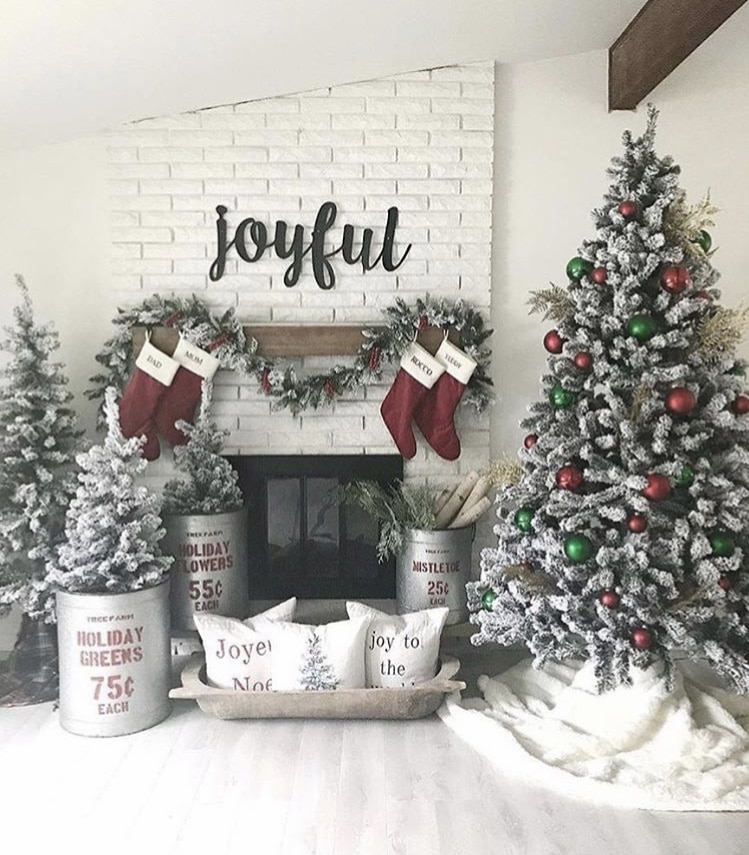Primitive Christmas Decor by The Thankful Farmhouse pillows in a dough bowl and trees and wood in galvanized metal bins