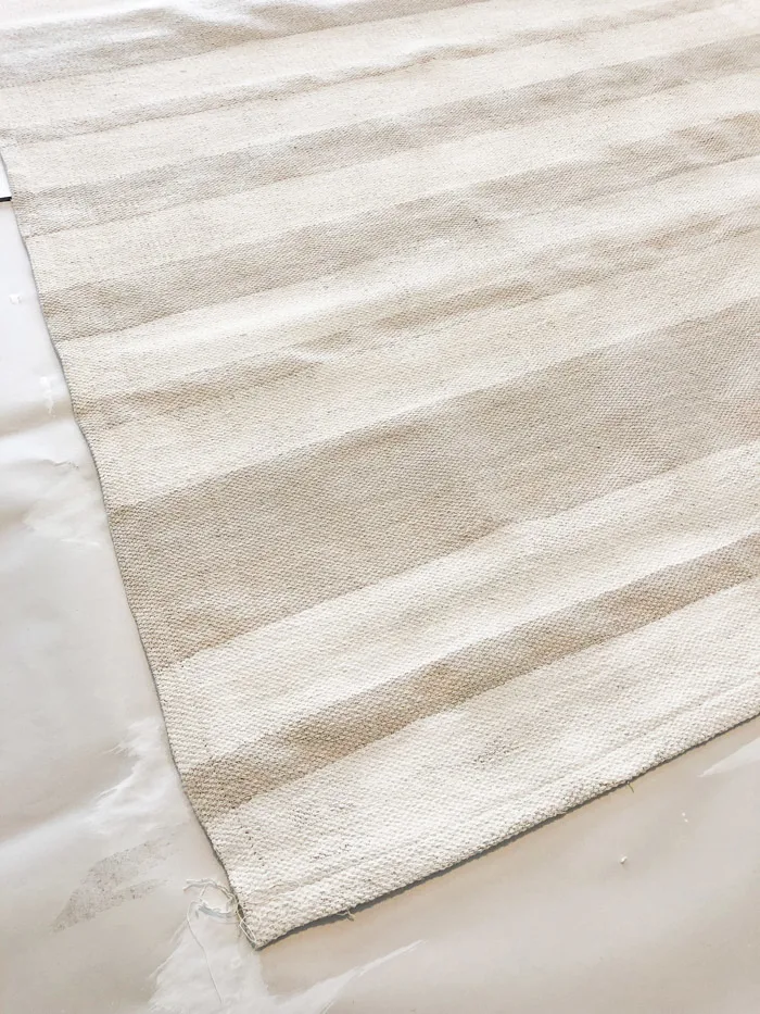 DIY rug using a drop cloth and chalk paint