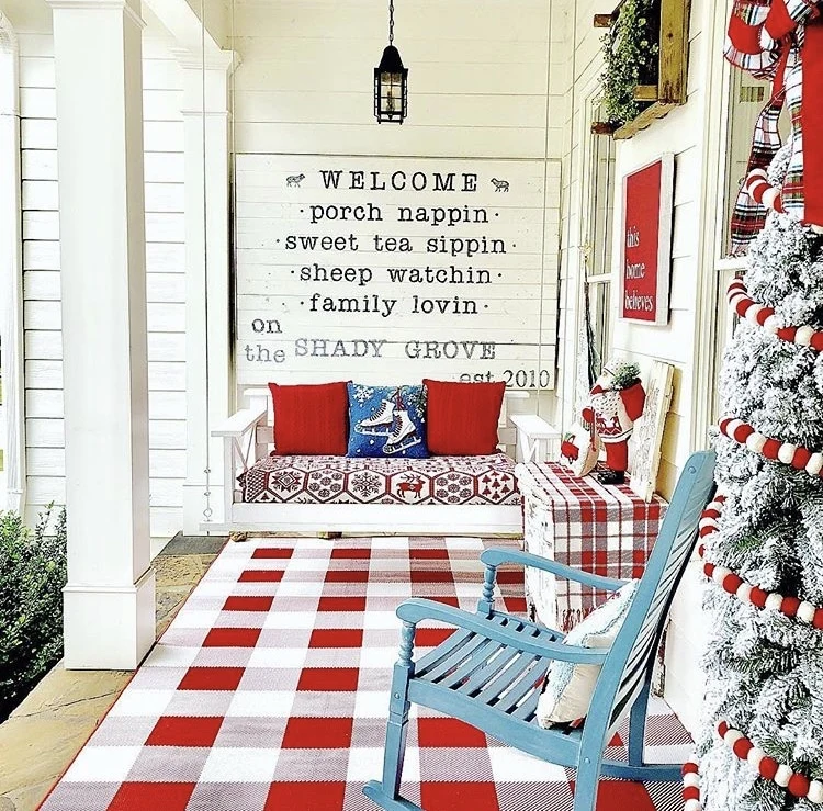 Christmas decorating ideas for porches by Life on the Shady Grove red buffalo check and red and white ball garland