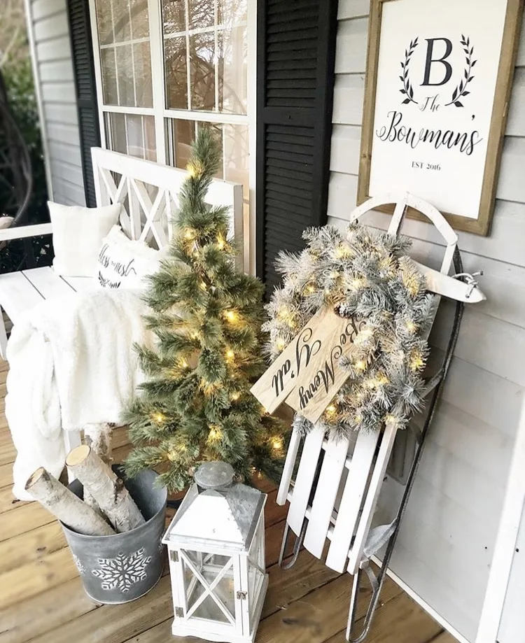 Christmas decorating ideas for porches by Distressed Bowman Nest Sled, Tree, Wreath, Lantern and Lights
