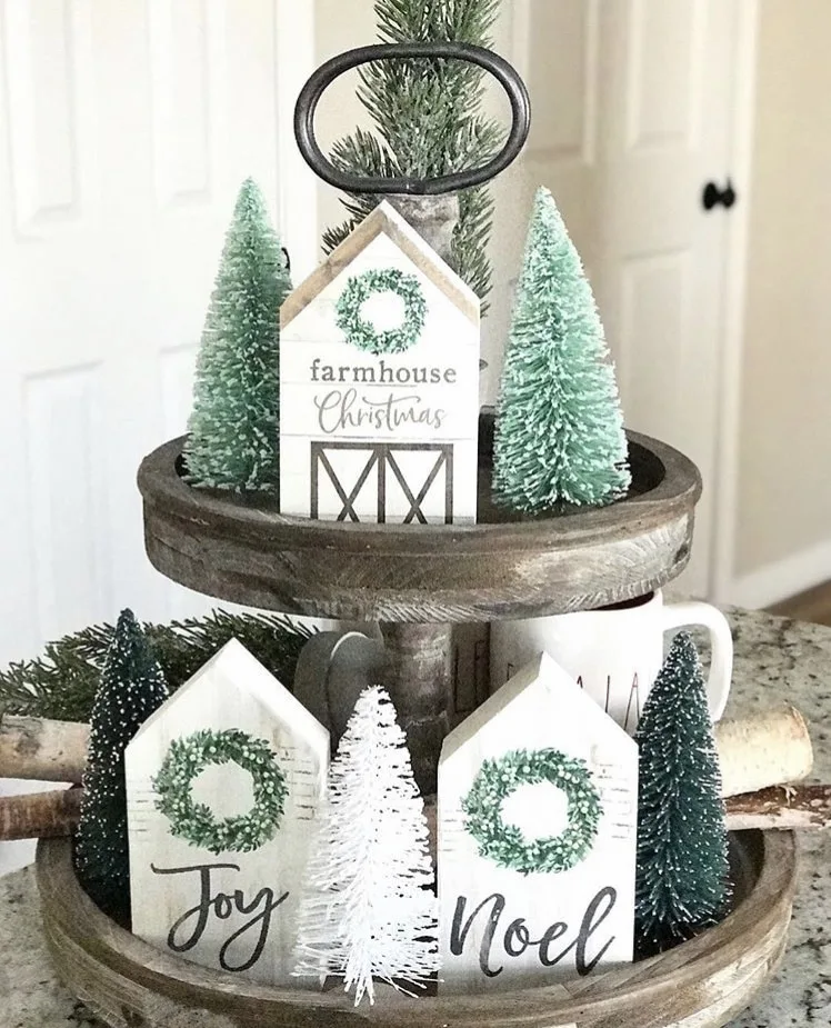 Christmas Farmhouse Tiered Tray by House on Wren with green bottle brush trees and mini wooden house signs