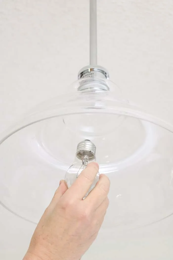 How to change a light bulb by screwing in the bulb to the right