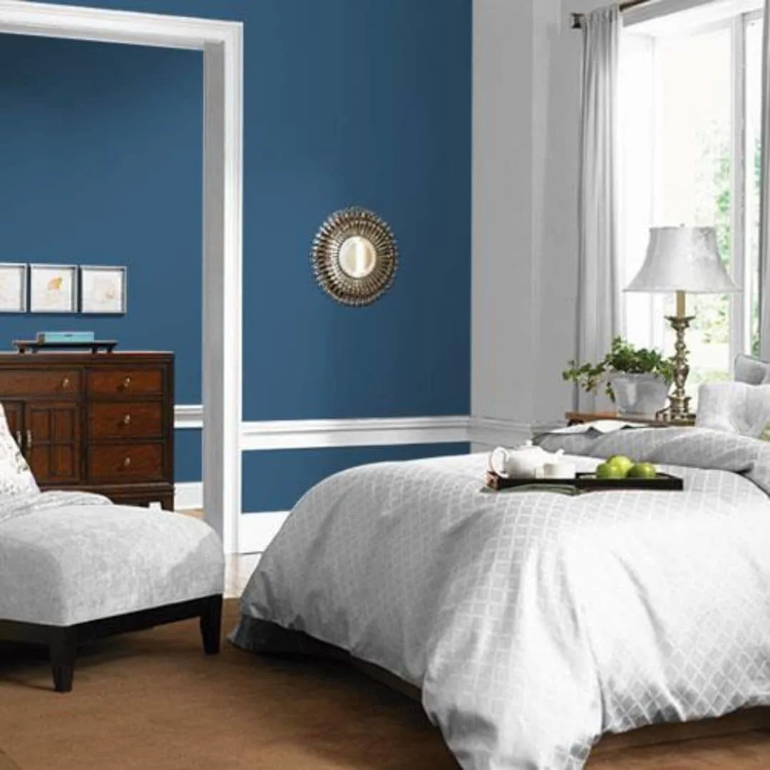 The color of the year for PPG is Chinese Porcelain PPG1160-6 painted on the walls of a bedroom