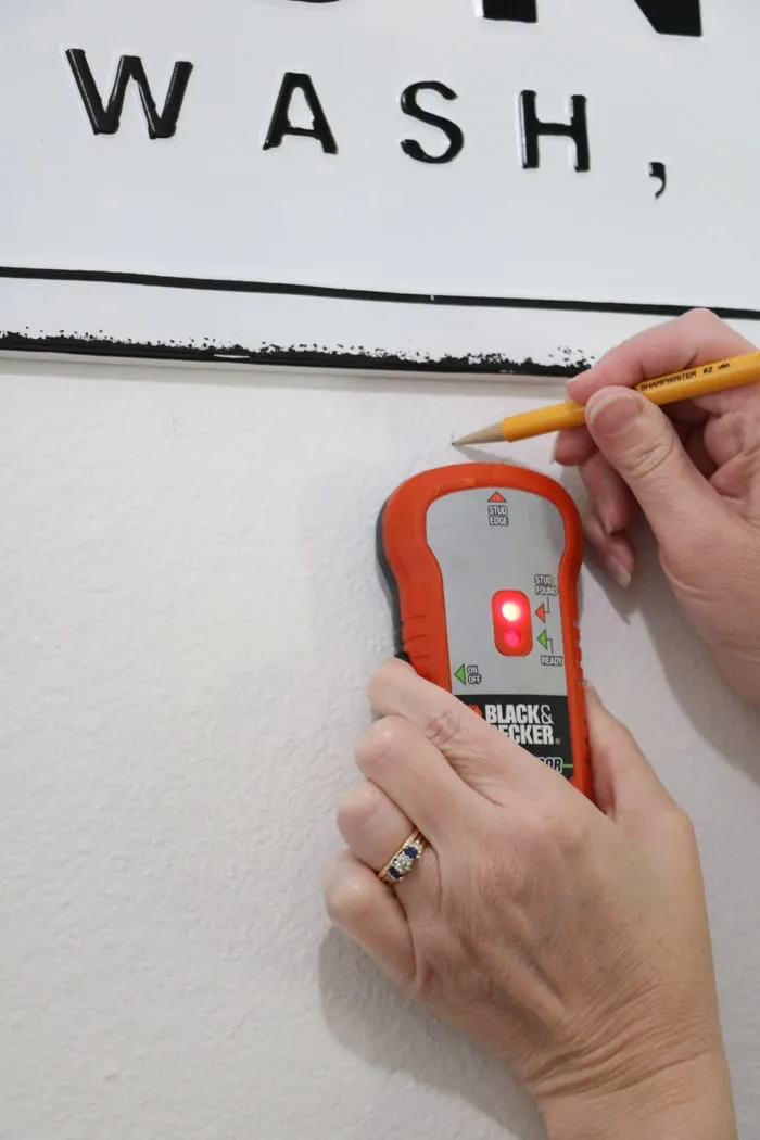 Find the studs in the wall when creating a DIY coat rack 