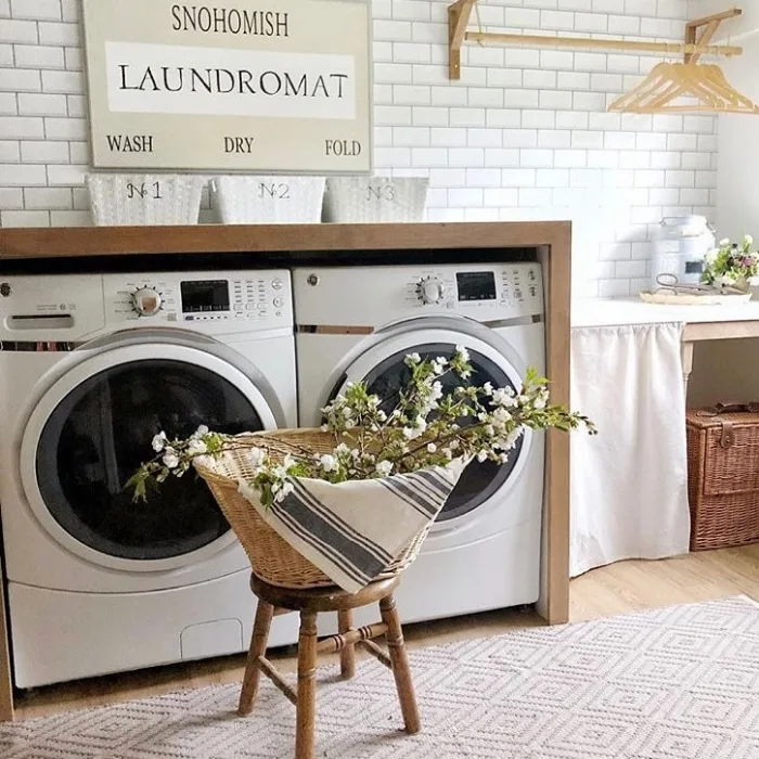 Farmhouse Laundry Room Decor by The Dukes of Snohomish with their own laundromat sign