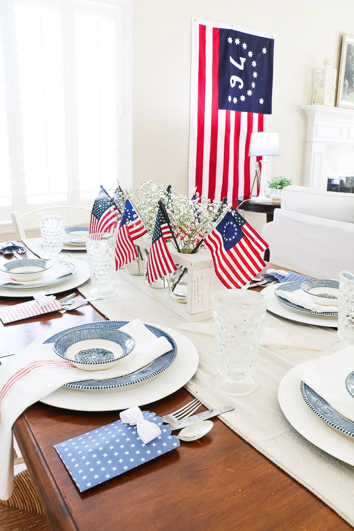 red, white and blue decorations for a fourth of July tablescape