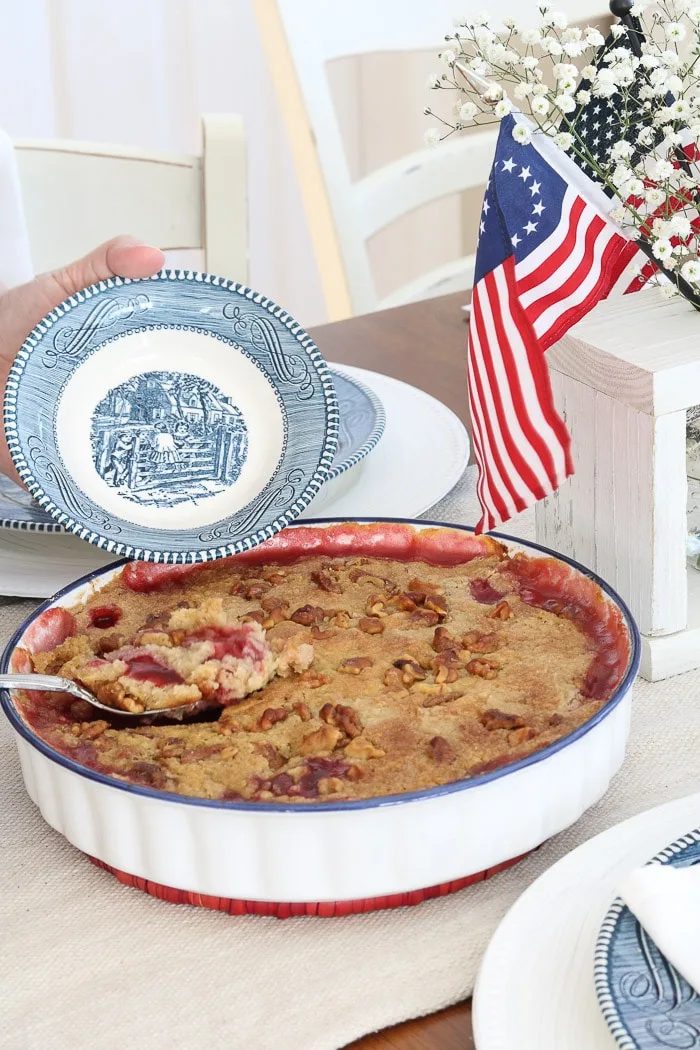 4th of July tablescape idea with a beautiful centerpiece and cherry dump cake