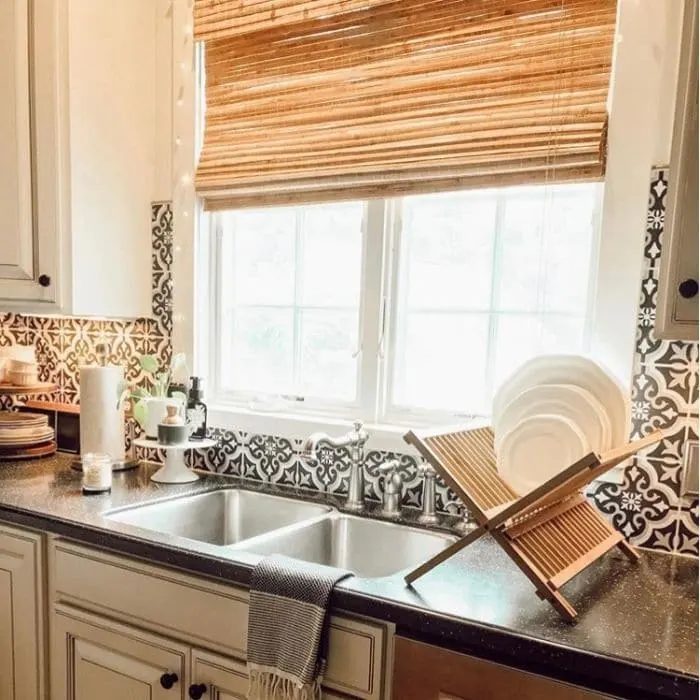 Farmhouse Backsplash by Life With Ginger Lee with black and white Spanish design tiles