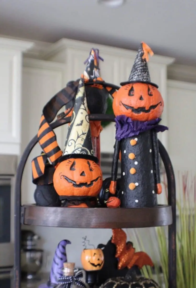 Halloween tiered tray ideas for home.  Jack o'lantern people with magician hats on a three tiered tray.