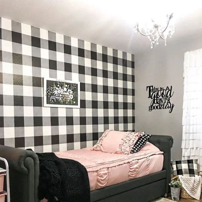 Farmhouse Style Wallpaper by Our Home on the Ridge with a black and white buffalo check wallpaper in a bedroom with pink accents