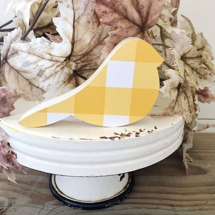 Budget friendly boutique fall Decor Ideas from jane.com with farmhouse wood birds of yellow and white check, florals and more.