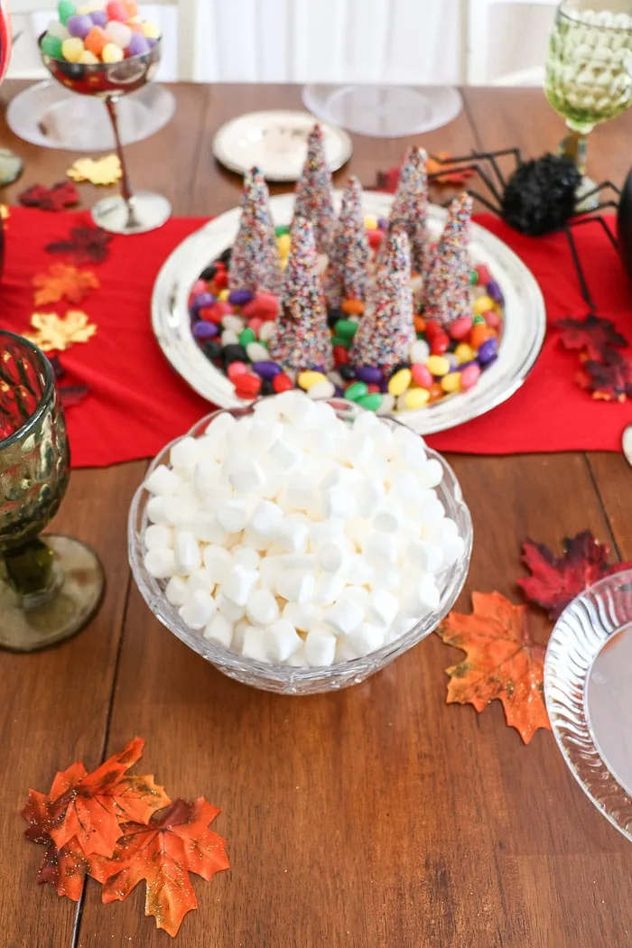 Harry Potter table decorations.  Add marshmallows to a bowl.