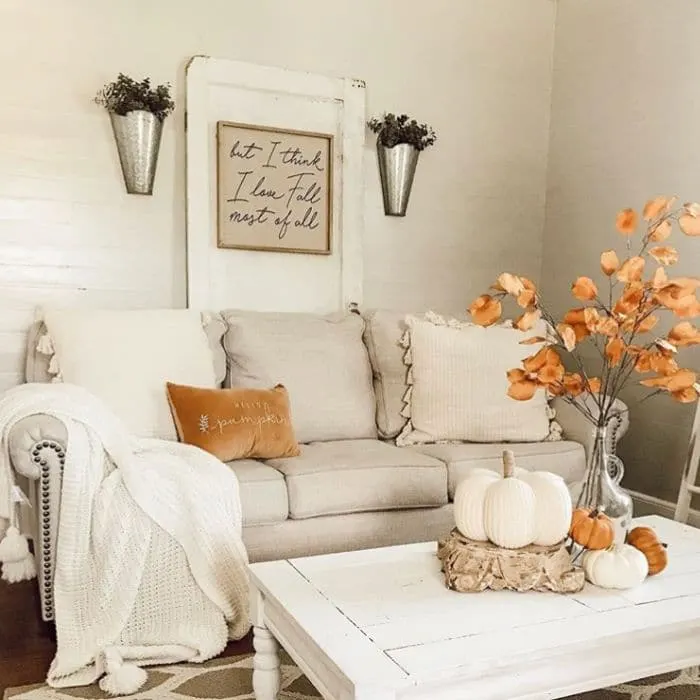 Fall Home Decor by The Finley Farmhouse with golden fall hughes in her living room