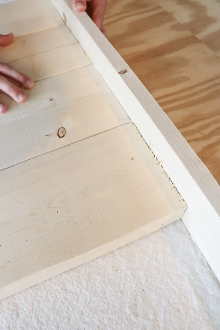 how to build a farmhouse table.  Line up the boards. 