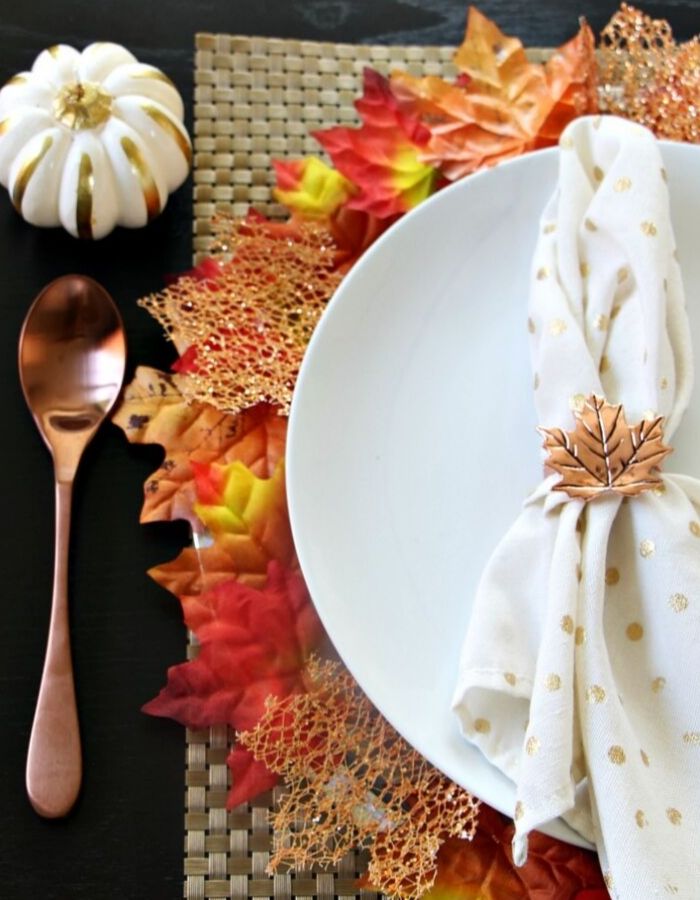 Dollar Store Fall Tablescapes with a maple leaf charger plate by This Is Our Bliss