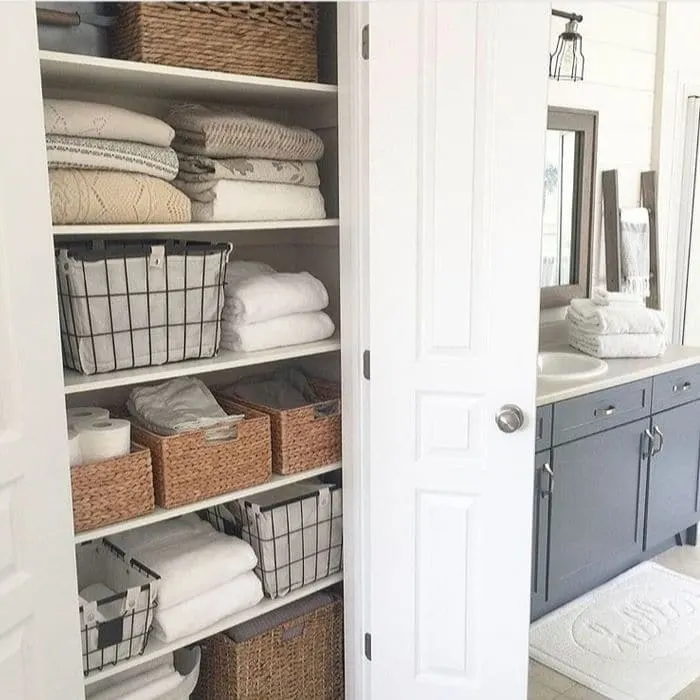 How To Decorate With Baskets with bathroom organizing with baskets by Willow Bloom Home Blog