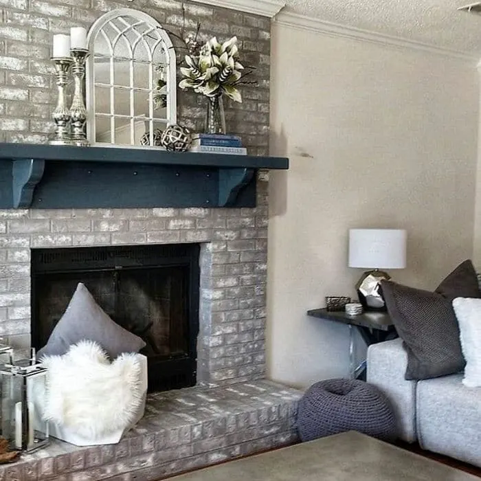 Fireplace Makeovers by Decorate And More With Tip with a taupe and white painted fireplace