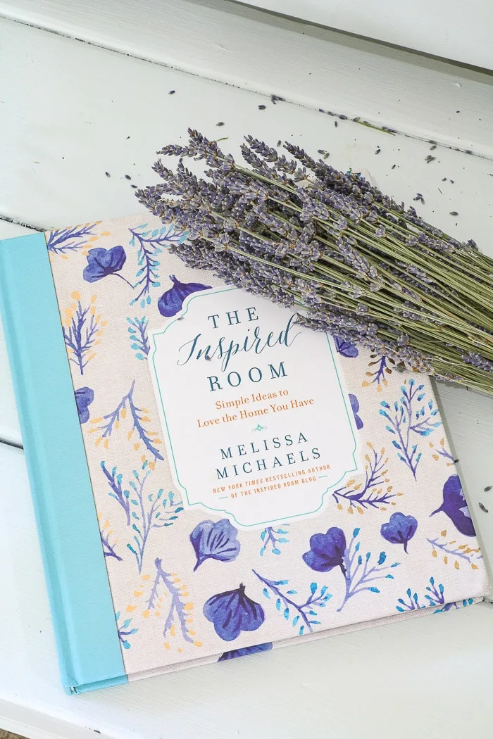 The Inspired Room by Melissa Michaels.  A beautiful coffee table book with dried lavender.  One of the best interior design books for beginners.