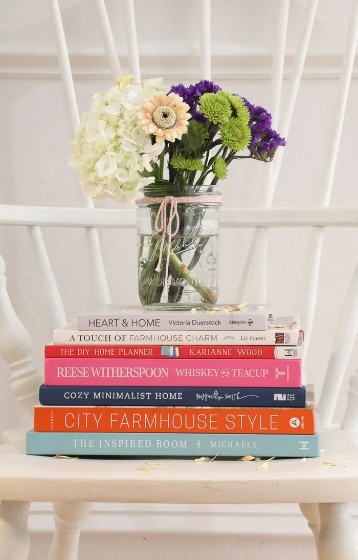 7 best interior design books for beginners.  Heart and Home, A Touch of Farmhouse Charm, The DIY Home Planner, Whiskey in a Teacup, Cozy Minimalist Home, City Farmhosue Style, The Inspired Room.