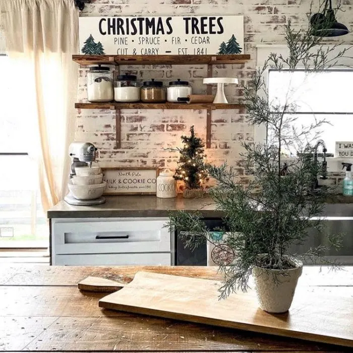 Christmas Kitchen Decor by Cotton N Copper with Christmas wooden signs in her kitchen