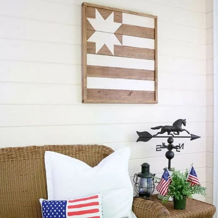 Decorating With Barn Quilts with a barn quilt hanging on the porch