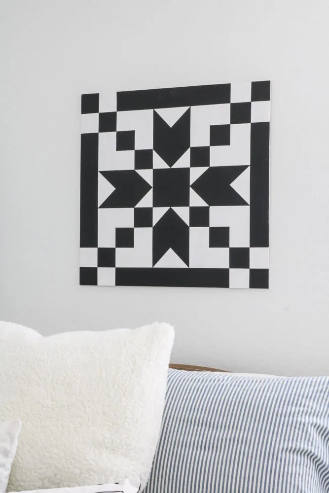 DIY barn quilt in the stepping stone pattern in coal black and casement white.