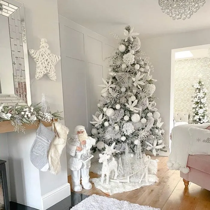 White Christmas Light Ideas by Forest House Home Styling with a white decorated Christmas tree with touches of silver
