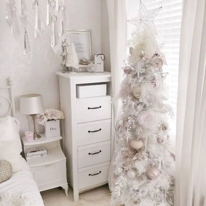 White Christmas Tree Decor by Fabulously Exhausted with pink and white Christmas tree decor in a bedroom