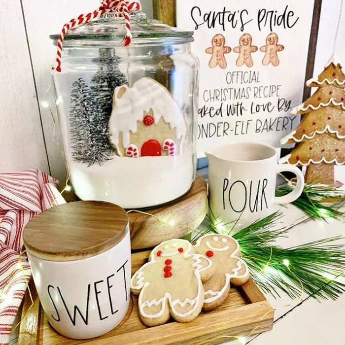 Decorating With Gingerbread Houses by Farm To Table Creations with a gingerbread house cookie in a glass jar